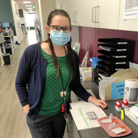 Pharmacist Elise Phelps preparing for a Tuesday afternoon COVID-19 vaccine clinic open to the community at Virginia Garcia Memorial Health Center in Beaverton, Oregon.