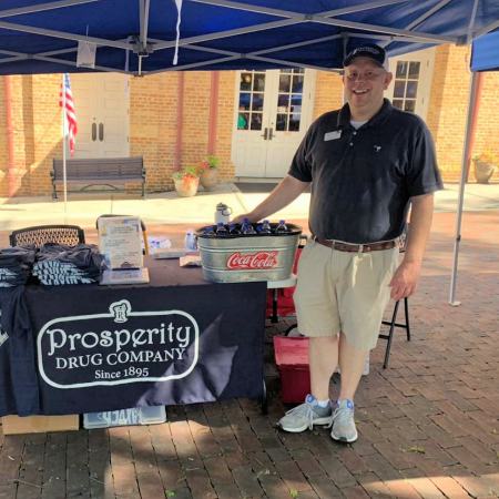 Pharmacist John Pugh offers COVID-19 vaccines and vaccination-themed t-shirts at the Juneteenth celebration in Newberry, South Carolina.
