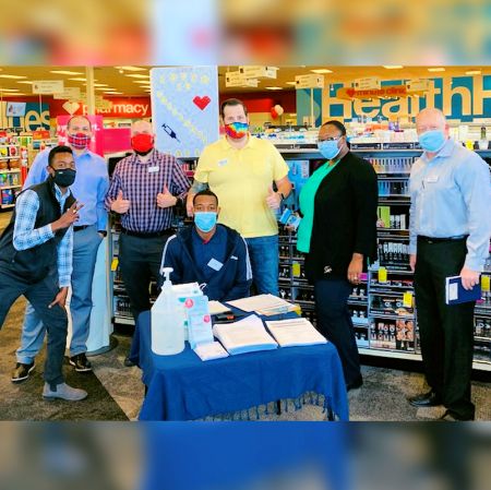 Pharmacist Justin Ellis (far left) with his CVS colleagues before an in-store COVID-19 vaccination clinic in Phoenix, Arizona.