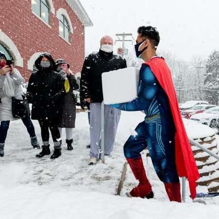 In the middle of a snowstorm, pharmacist and "Superman" Mayank Amin delivers COVID-19 vaccine to the first vaccine clinic in Skippack, Pennsylvania.